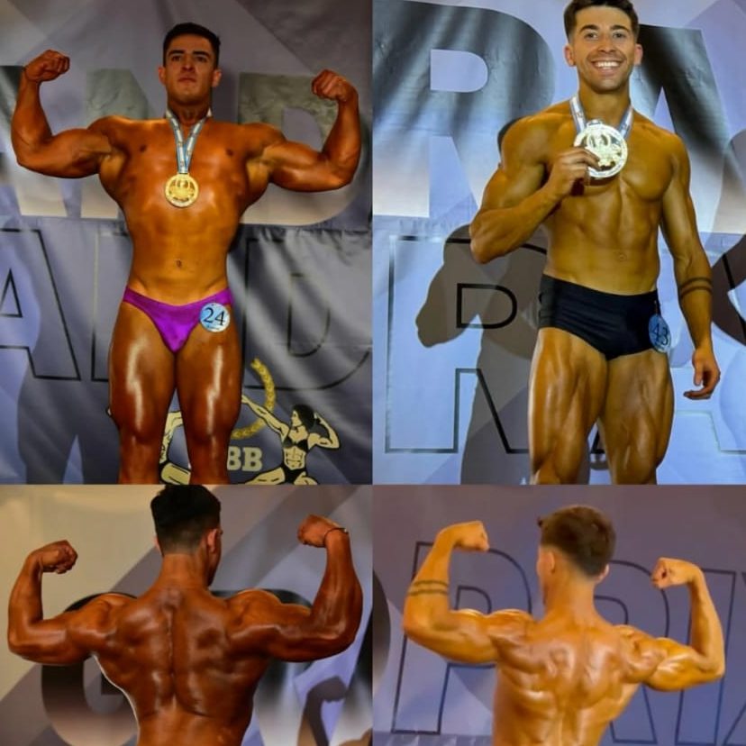 Atletas del gym posando con sus medallas en el escenario
